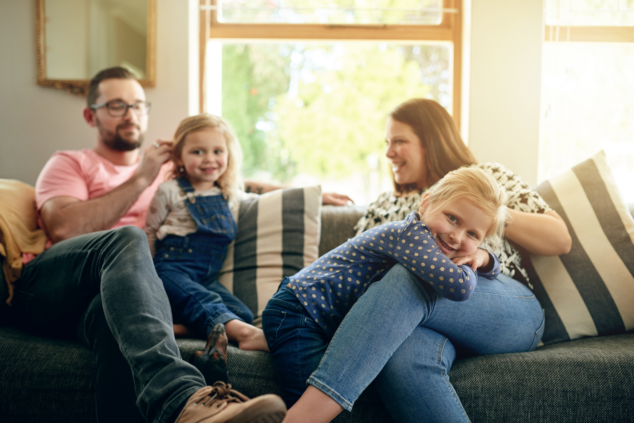 Shot of a young family spending time together at home